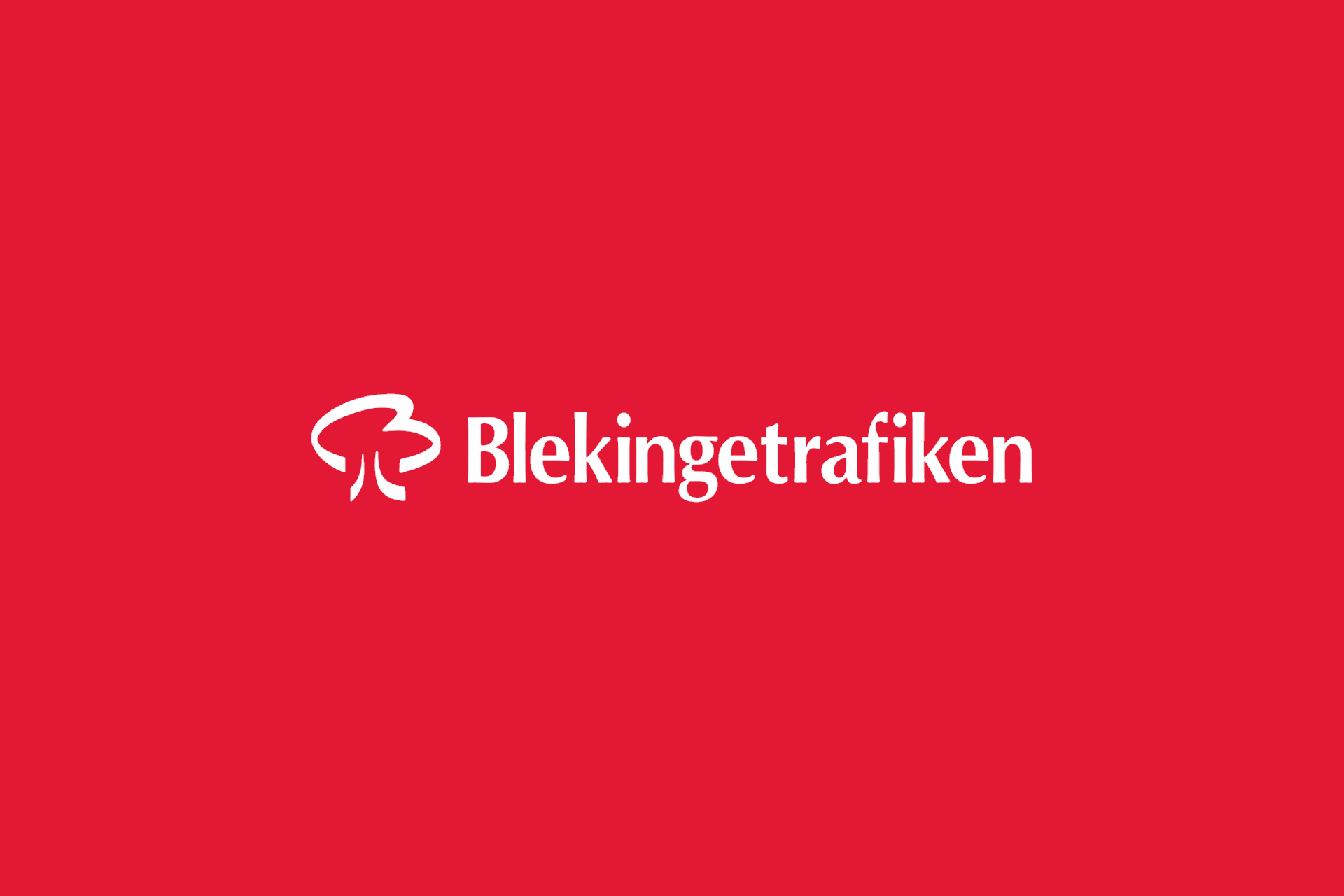 Blekingetrafikens vita logotyp mot röd bakgrundsfärg.